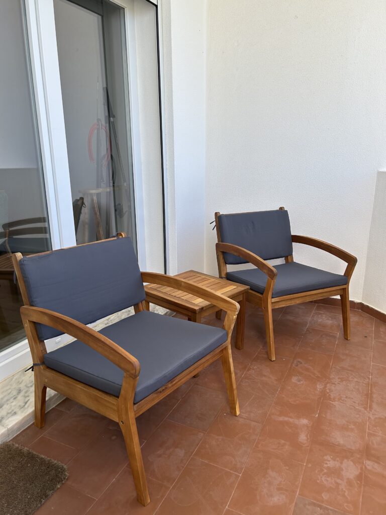 Resting chairs in the balcony at Euthymia Surf House, Baleal